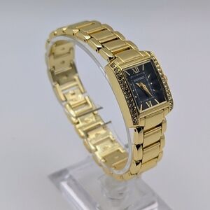 Elegant Gold Bracelet Watch with Black Face